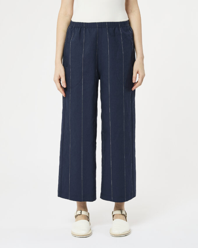 pantalone dritto con tasca tonda